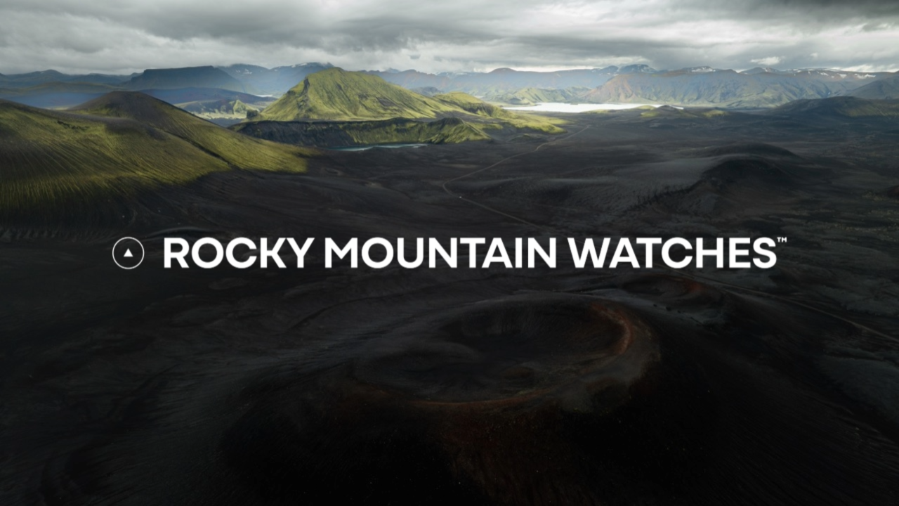 Scenic mountain landscape with 'Rocky Mountain Watches' text overlay
